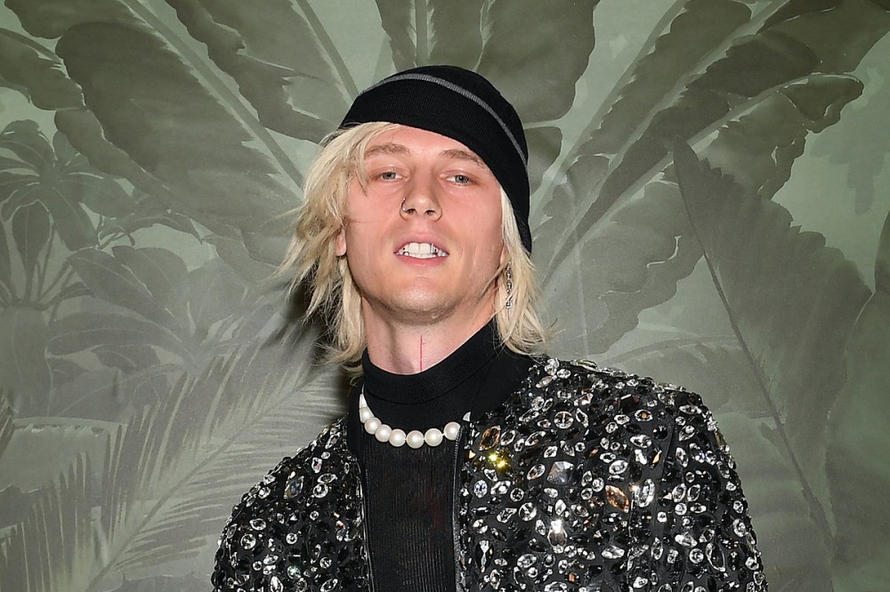 Machine Gun Kelly Rocks the Bald Look, Revealing Seeming Scalp Tattoo Machine Gun Kelly Rocks the Bald Look, Revealing Seeming Scalp Tattoo