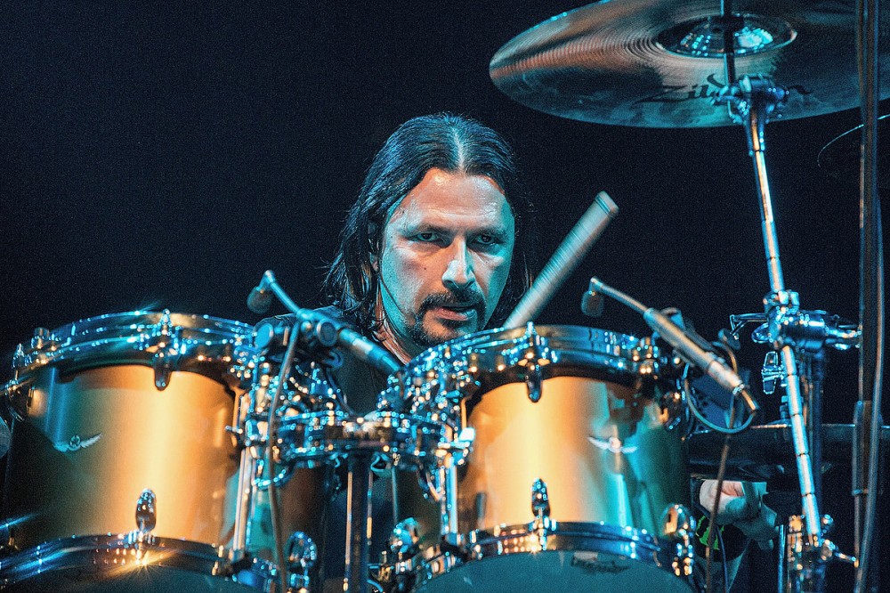 Exodus Re-Enlist Drummer John Tempesta for Two Shows While Tom Hunting’s Recovery Continues Exodus Re-Enlist Drummer John Tempesta for Two Shows While Tom Hunting’s Recovery Continues