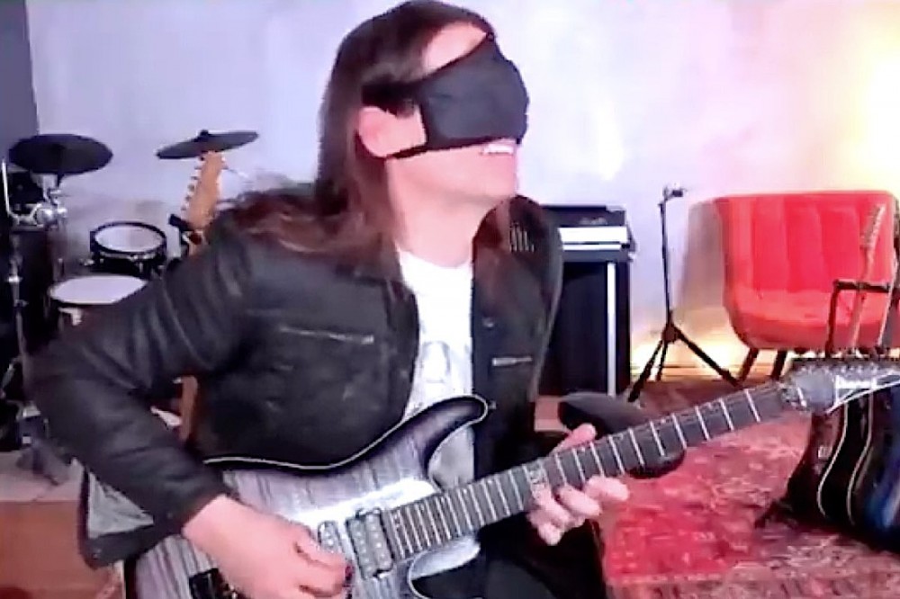 Watch Megadeth’s Kiko Loureiro Nail Blindfolded Guitar Challenge Watch Megadeth’s Kiko Loureiro Nail Blindfolded Guitar Challenge
