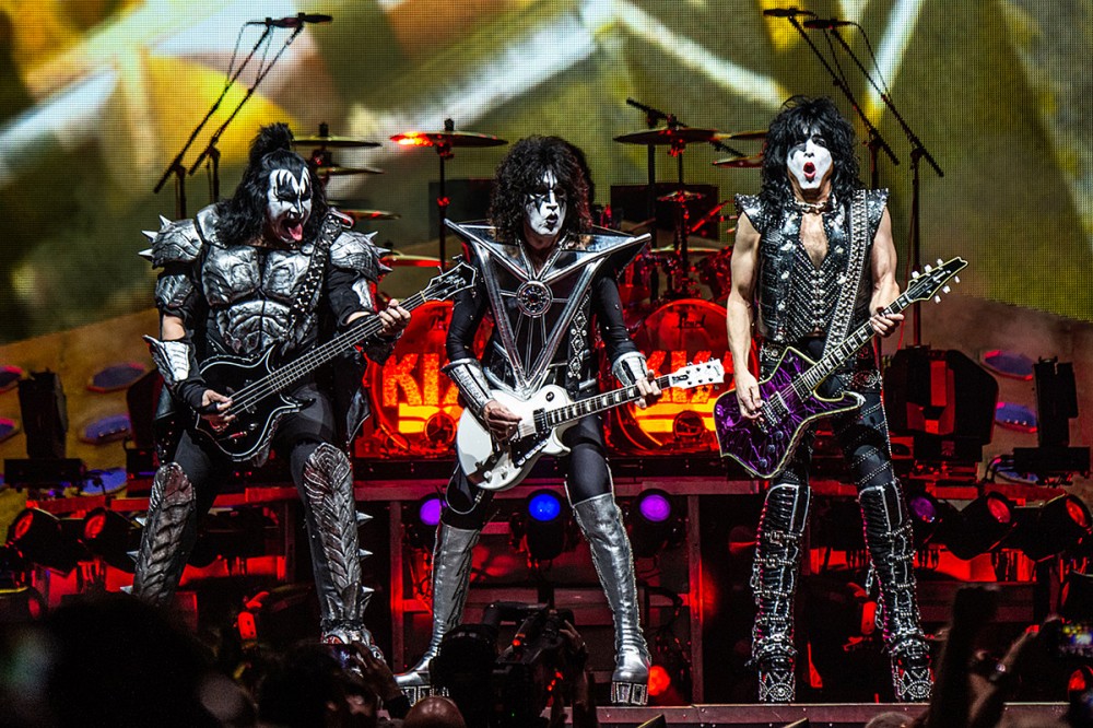 KISS Crew Members Believe Loose COVID Protocols Led to Guitar Tech’s Death, Band Refutes Claims KISS Crew Members Believe Loose COVID Protocols Led to Guitar Tech’s Death, Band Refutes Claims