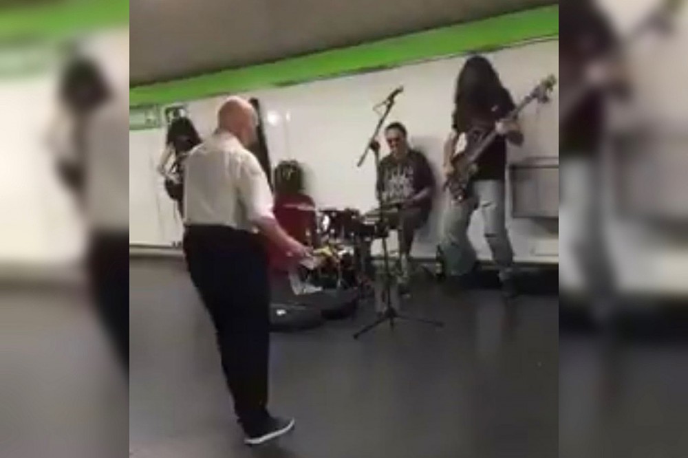 Man Really Cutting a Rug to Metallica Cover Band at Subway Station Man Really Cutting a Rug to Metallica Cover Band at Subway Station