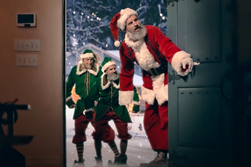 See Tool’s Justin Chancellor + Danny Carey in New Dunlop Christmas Commercial See Tool’s Justin Chancellor + Danny Carey in New Dunlop Christmas Commercial